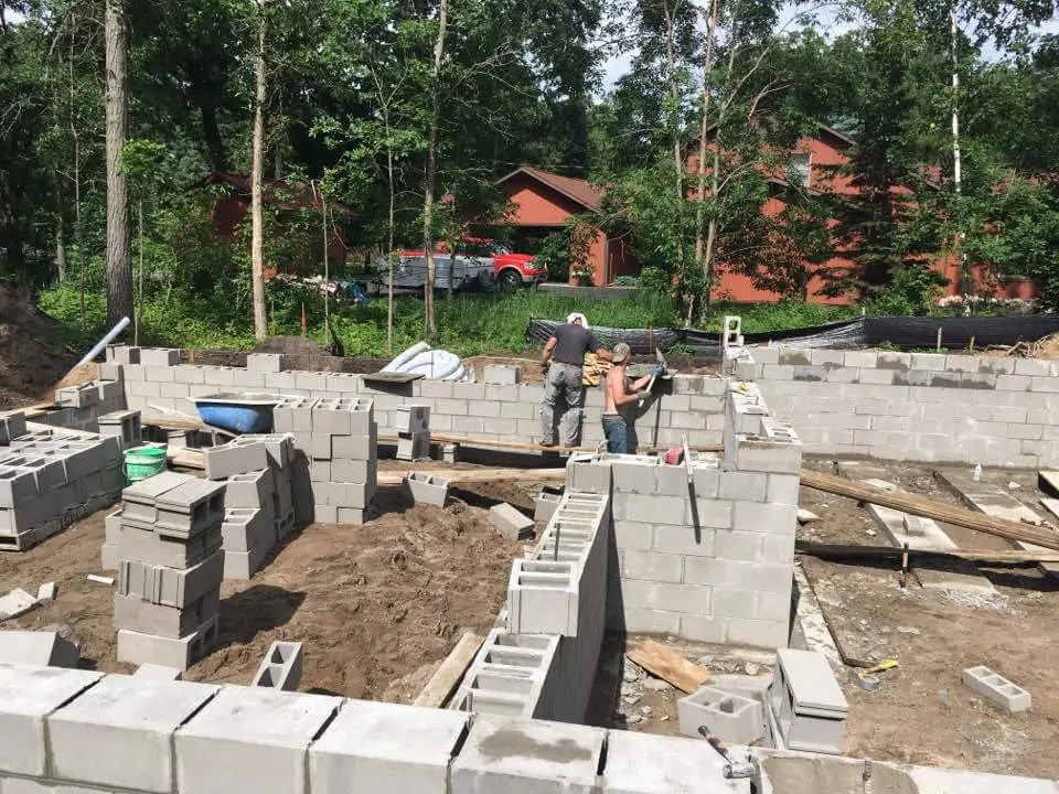 Block foundation under construction by Sam's family concrete business